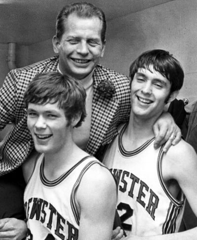 Dick Olson, with players like Dave, left, and Dale Smith, made Brewster a record-setting winner.  (File / The Spokesman-Review)