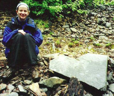 
Sara Donally, 24, posing with a heart-shaped rock at Geiger Lakes in the Cabinet Mountains Wilderness. 
 (Photo courtesy of Sara Donally / The Spokesman-Review)