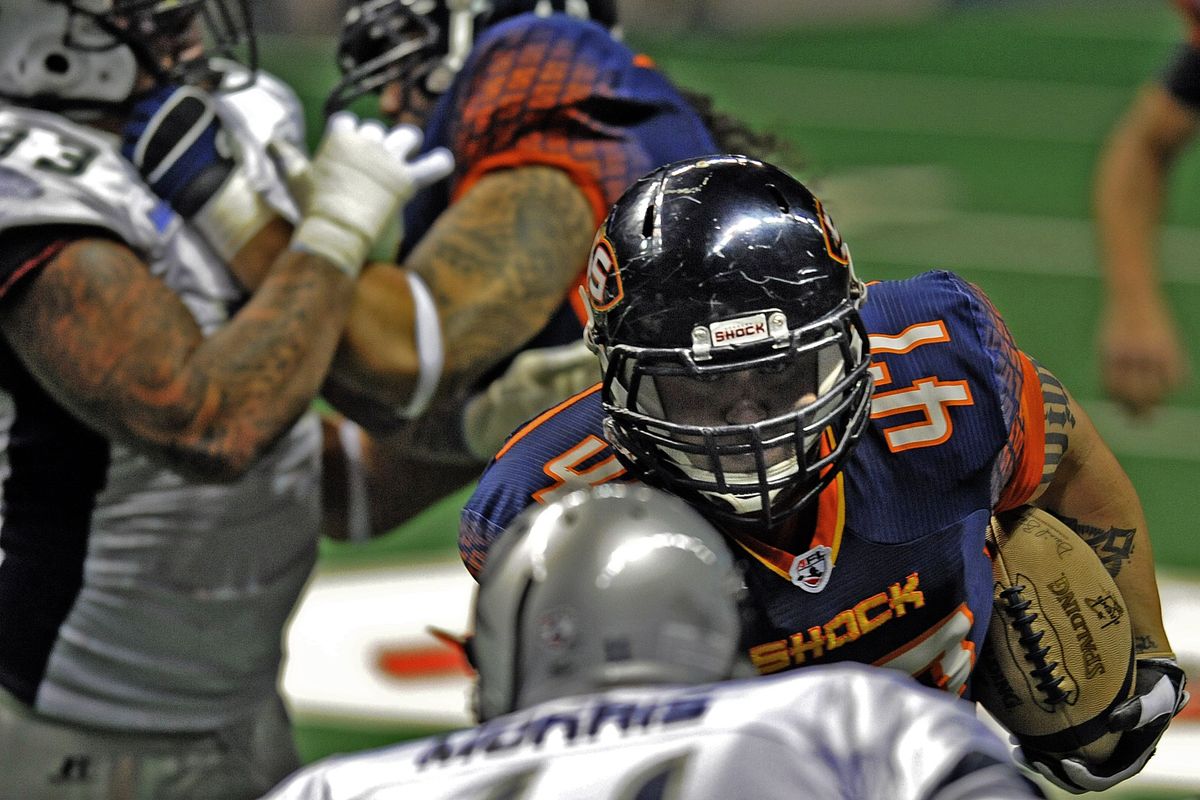 Shock running back Clay Harnell gains tough yards inside against the Chicago Rush Saturday night in the Arena. (Christopher Anderson)