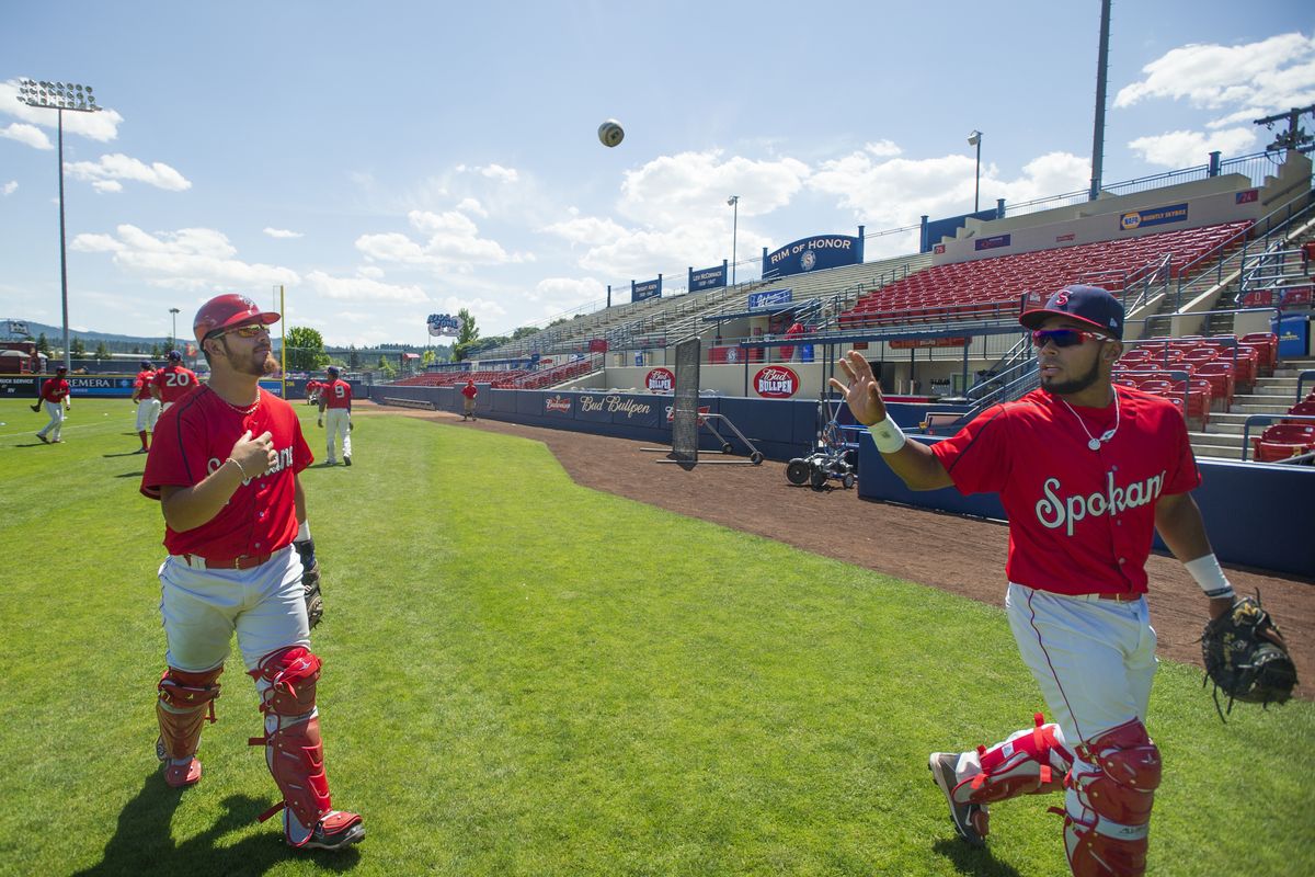Curacao native and Spokane Indians catcher Sherman Lacrus, right, made the move from the outfield to behind the plate last season in the Arizona Rookie League. (Tyler Tjomsland)