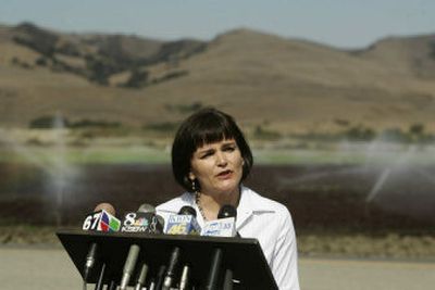Samantha Cabaluna, spokeswoman for Natural Selection Foods, tells the media in San Juan Bautista, Calif., on Wednesday that a bag of tainted spinach contaminated with E. coli came from one of the commercial farms that supplies spinach to the company.
(Associated Press / The Spokesman-Review)