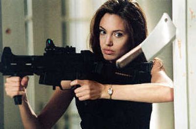 
Angelina Jolie narrowly avoids a meat cleaver in 