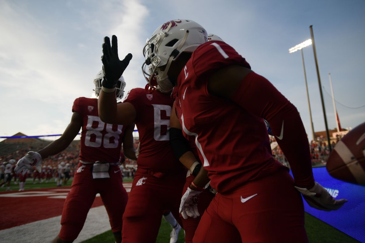 WSU receiver Travell Harris (1) celebrates after he scored a touchdown during the second half of a college football game on Saturday, Sep 11, 2021, at Gesa Field in Pullman, Wash. WSU won the game 44-24.  (Tyler Tjomsland/The Spokesman-Review)