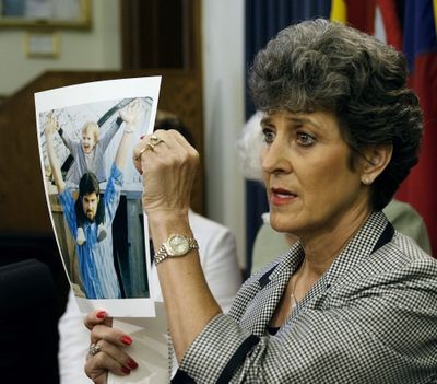 Judy Cavnar,  a cousin of executed prison inmate Cameron Todd Willingham, displays a picture of him during a news conference in Austin, Texas, on May 2, 2006.  (File Associated Press / The Spokesman-Review)