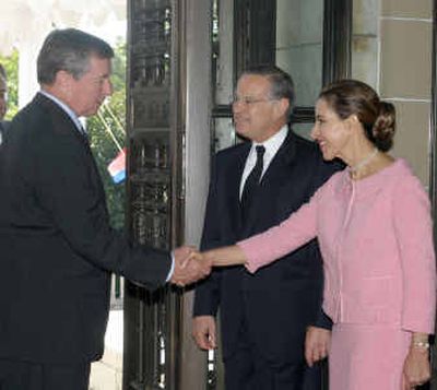 
Former Costa Rican President Miguel Angel Rodriguez and his wife, Lorena deRodriguez, greet Attorney General John Ashcroft at the Organization of American States in Washington on Sept. 23, before a ceremony where Rodriguez was installed as the organization's secretary-general. 
 (Associated Press / The Spokesman-Review)