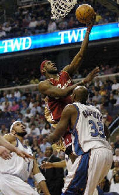 
LeBron James expects to elevate his game further for his first postseason, which comes in his third NBA season. 
 (Associated Press / The Spokesman-Review)