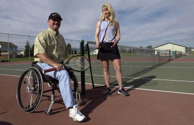 
Tim Scott and Laura Bradley together won the Outback Tennis Tournament in Coeur d'Alene. Scott has taught Bradley about how to work with disabled players. 
 (Kathy Plonka / The Spokesman-Review)