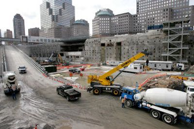 
A concrete truck is cleaned at the World Trade Center site after delivering materials Saturday for the Freedom Tower's base.
 (Associated Press / The Spokesman-Review)