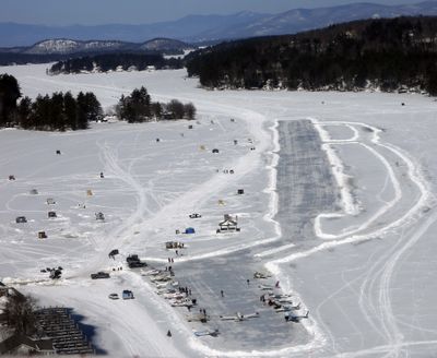 Planes are parked after flying in on frozen Lake Winnipesaukee Saturday in Alton, N.H.