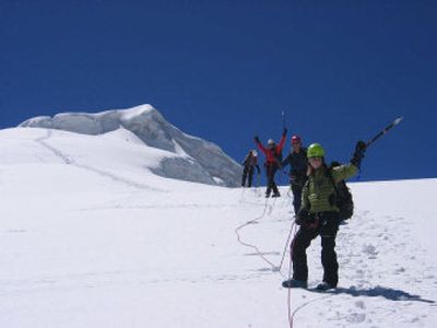 
The group from University of Idaho's Outdoor Program waves while climbing Ishinca in Peru.
 (Photo courtesy of UI Outdoor Program / The Spokesman-Review)