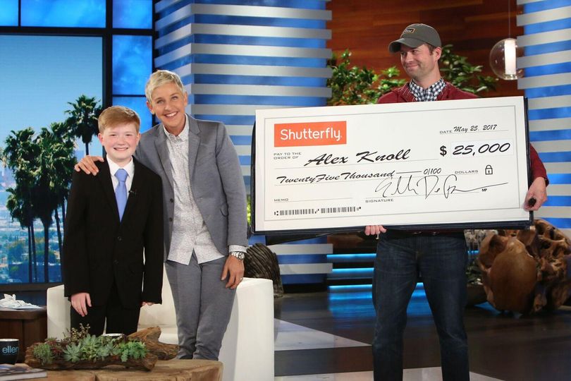 Ellen DeGeneres presents $25,000, courtesy of Shutterfly, to Alexander Knoll, a 12-year-old inventor from Post Falls, to help him launch his free Ability App to help people with disabilities navigate public spaces and find safe, reliable services and employment opportunities. The show aired Thursday at 3 p.m. on KHQ. (Michael Rozman/Warner Bros.)