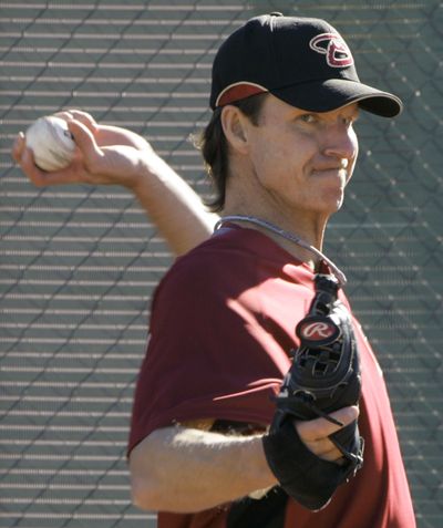 Randy Johnson will continue his career with the San Francisco Giants for at least one season.  (Associated Press / The Spokesman-Review)