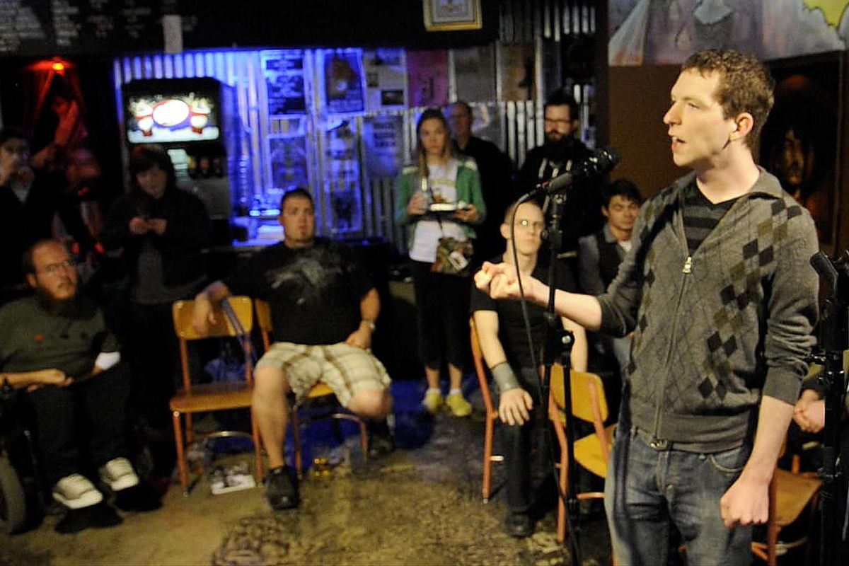 Mark Anderson, shown emceeing a Broken Mic Night, in 2012, was named Spokane’s new poet laureate on Saturday, Nov. 4. He is the city’s third poet laureate, following Laura Read and Thom Caraway. (Colin Mulvany / The Spokesman-Review)