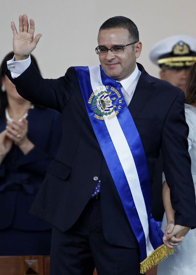 President of El Salvador Mauricio Funes waves after his swearing in ceremony in San Salvador on Monday.  (Associated Press / The Spokesman-Review)