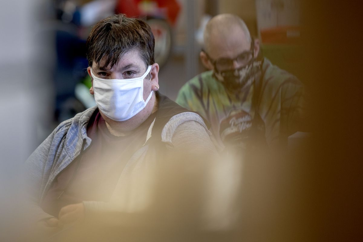 Terri Manning, 64, assembles tree plugs at Tesh Vocational Center, a local nonprofit that helps people with disabilities gain employment and independent living in Coeur d’Alene on March 4.  (Kathy Plonka/The Spokesman-Review)