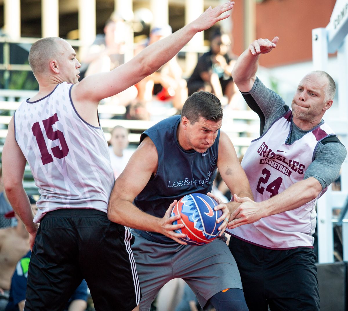 Marc Axton of Lee and Hayes is double-teamed by Bobby and the Boys teammates during the men’s elite 6 feet and over championship game at Hoopfest 2019.  (Libby Kamrowski/THE SPOKESMAN-REVIEW)