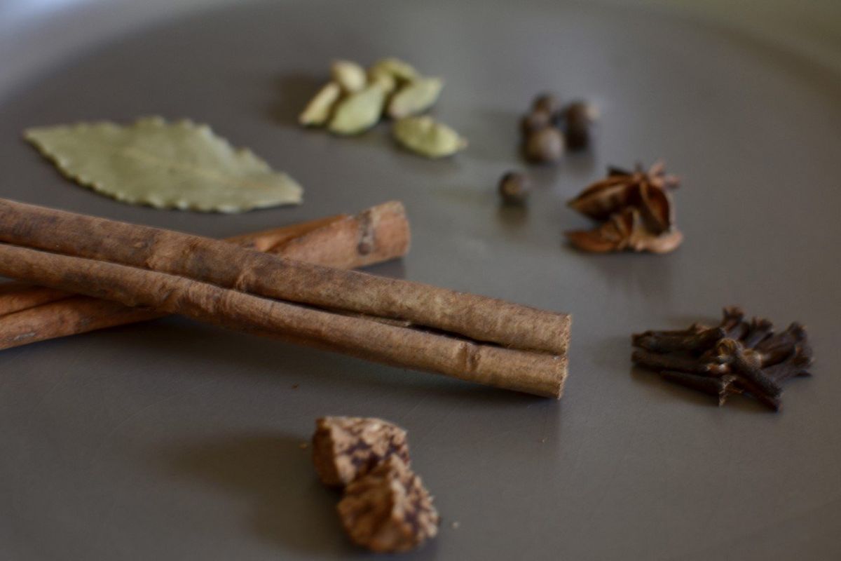 Whole spices such as bay leaf, cinnamon, nutmeg, cloves, star anise, allspice berries and cardamom pods bring warmth to mulled cider.  (Ricky Webster)