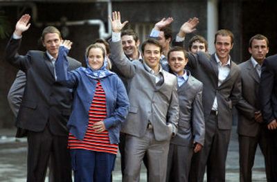 
British navy personnel wave  after their meeting with Iranian President Mahmoud Ahmadinejad in Tehran, Iran, on Wednesday. Ahmadinejad announced Wednesday   that 15 detained British sailors and marines would be released, and they left on a flight to London early today.
 (Associated Press / The Spokesman-Review)