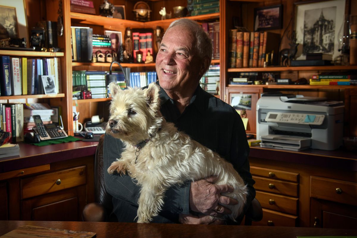 Don Higgins and his dog, Duffy, in Higgins’ man-cave on Monday in south Spokane. (Dan Pelle / The Spokesman-Review)