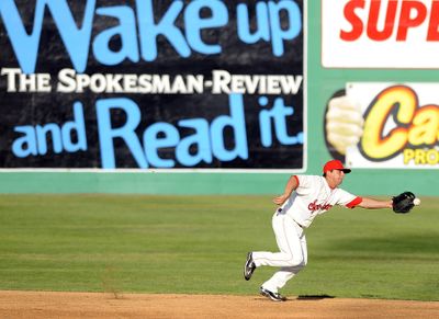 Spokane Indians shortstop Joe Bonadonna can’t quite haul in a base hit on Tuesday.  (Christopher Anderson / The Spokesman-Review)