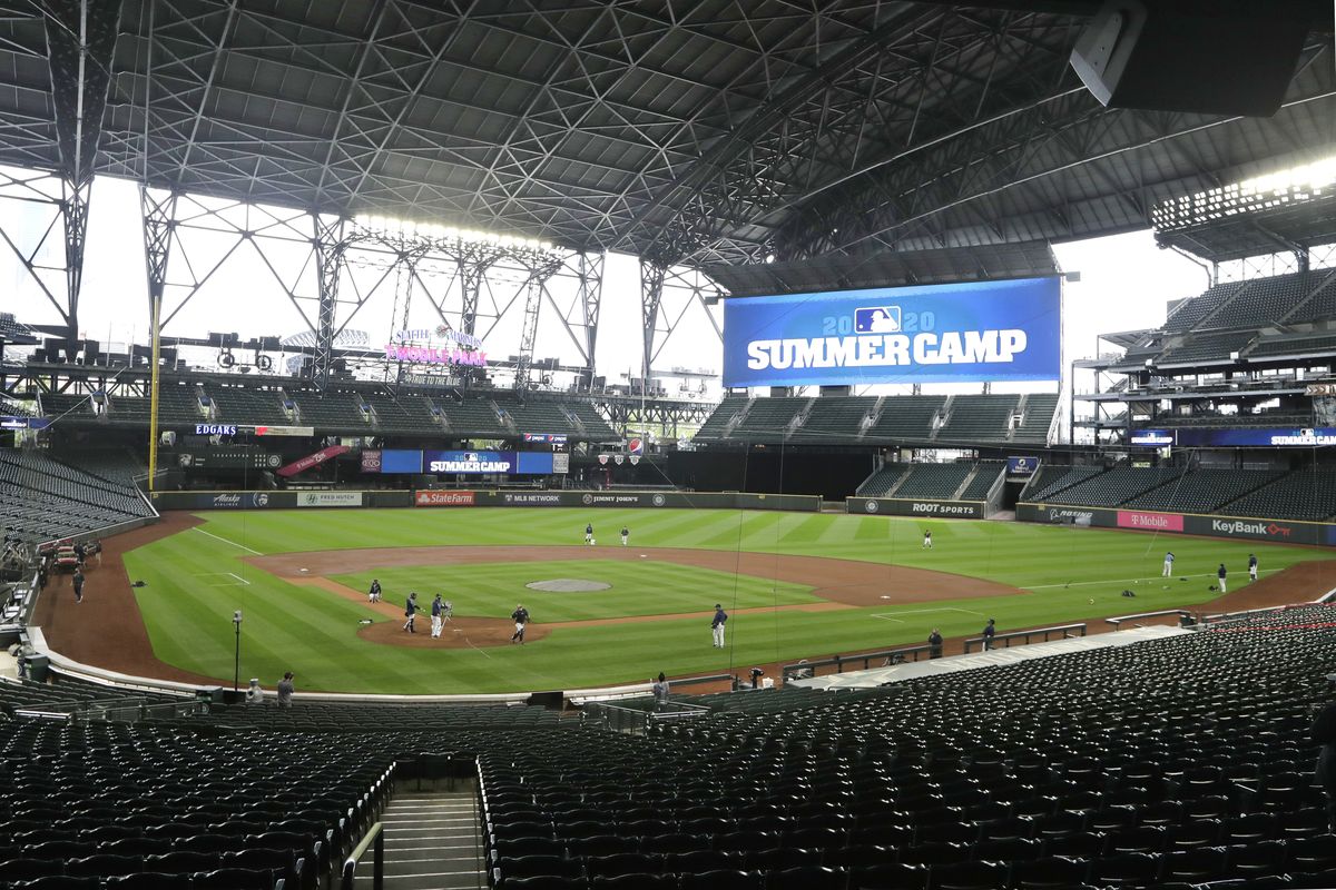 After a long delay in their baseball season, Seattle Mariners players begin a “summer camp” workout Friday at T-Mobile Park  (Elaine Thompson)