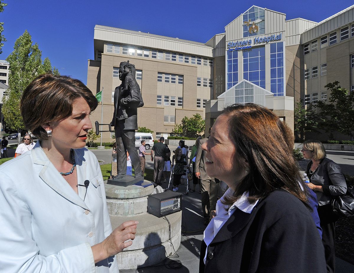 chrisa@spokesman.com U.S. Rep. Cathy McMorris Rodgers, left, and U.S. Sen. Maria Cantwell talk Thursday outside the Shriners Hospital for Children in Spokane. Both spoke at the Save Our Shriners rally. (CHRISTOPHER ANDERSON / The Spokesman-Review)