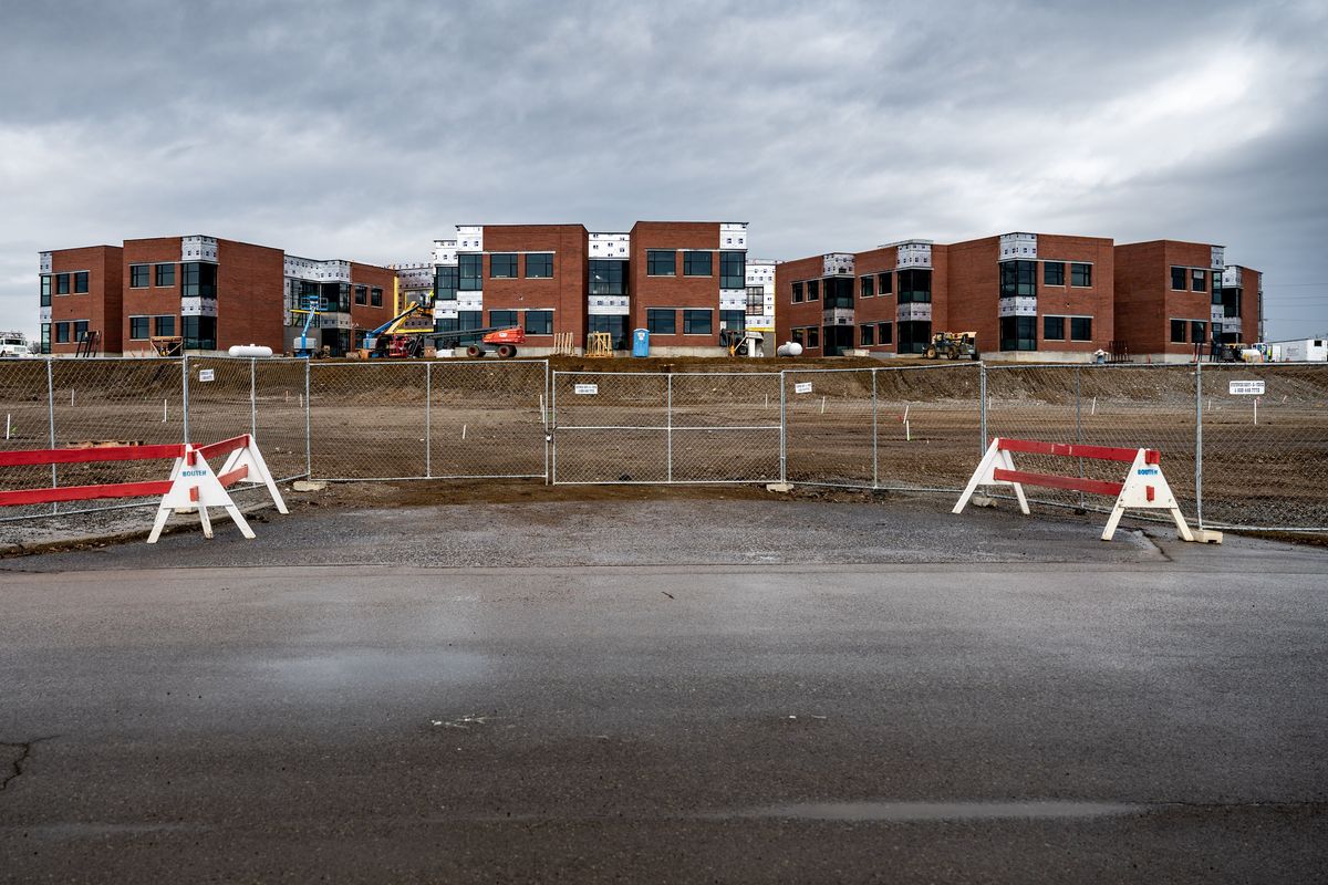 South view of the new Yasuhara Middle School and play field under construction in north Spokane, Monday, Feb. 14, 2022. The school will host sixth and seventh graders this fall and add eighth graders a year later.  (COLIN MULVANY/THE SPOKESMAN-REVI)