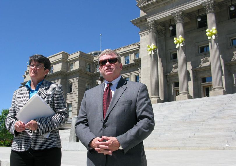 U.S. Attorney for Idaho Wendy Olson, left, and Idaho Attorney General Lawrence Wasden, right, announce final settlement Thursday afternoon on accessibility improvements to Idaho's renovated state Capitol (Betsy Z. Russell)
