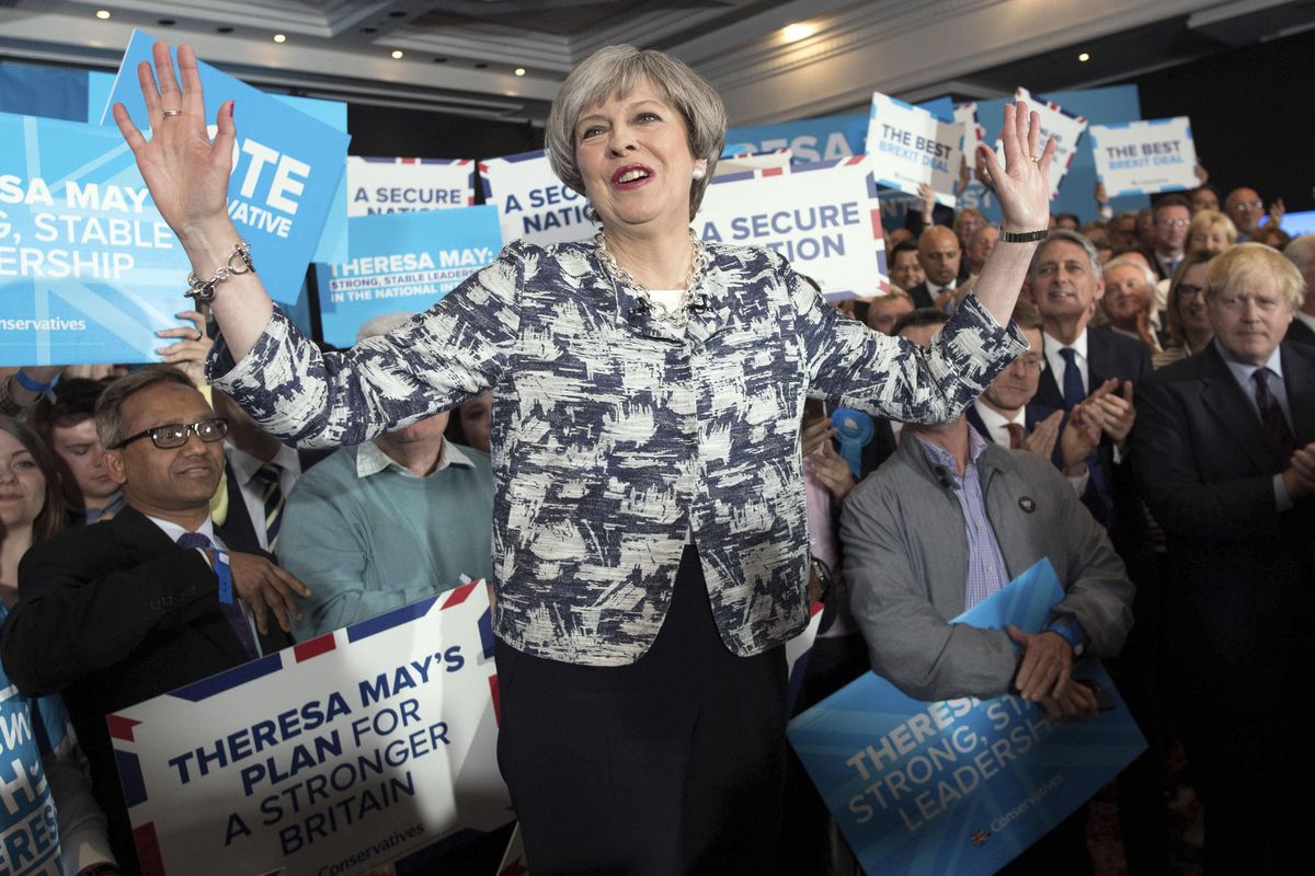 Britain’s Prime Minister Theresa May gestures at a rally while on the general election campaign trail in Birmingham, England, Wednesday June 7, 2017. (Stefan Rousseau / Associated Press)