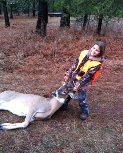 Natasha Puzon, 10, of Enumclaw, Wash., bagged her first deer in the last weekend of the November 2012 late whitetail buck hunt after traveling to northeastern Washington with her father, Mark Puzon. (Courtesy)