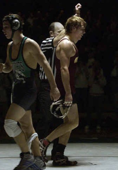 
University High's Jeremy Montang, right, wins his 140 match 8-0 against East Valley's Brice Parker, left at the GSL Wrestling Championship Jan. 29. 
 (Liz Kishimoto / The Spokesman-Review)