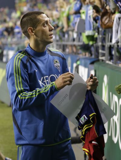An injury may leave Sounders standout Clint Dempsey on the bench tonight. (Associated Press)