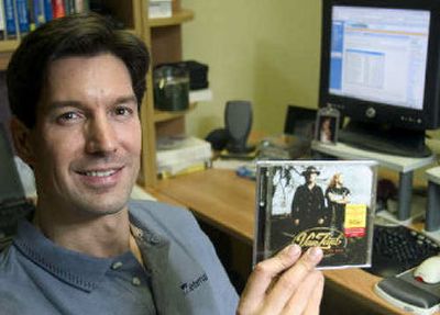 
Mark Russinovich is shown in his office with his Van Zandt CD from Sony BMG Music Entertainment, in which he discovered that the company had added a copy protection technology called XCP to his computer. Russinovich posted his findings to his blog, which generated serious attention and eventually forced Sony BMG to recall 50 different discs this week. Some 4.7 million had been made and 2.1 million sold. 
 (Associated Press / The Spokesman-Review)