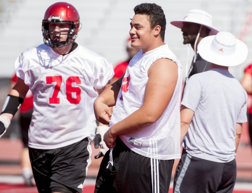 EWU right tackle Nick Ellison jokes with teammates during practice last week. (Tyler Tjomsland / The Spokesman-Review)