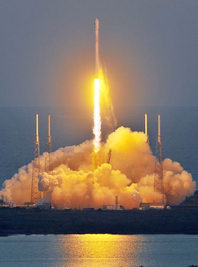 The unmanned Falcon 9 SpaceX rocket lifts off Wednesday in Cape Canaveral, Fla. (Associated Press)
