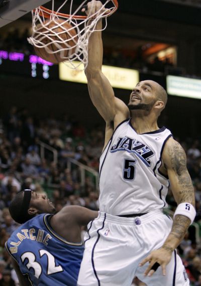 Addition of Carlos Boozer should help Chicago Bulls finish higher than eighth in East. (Associated Press)