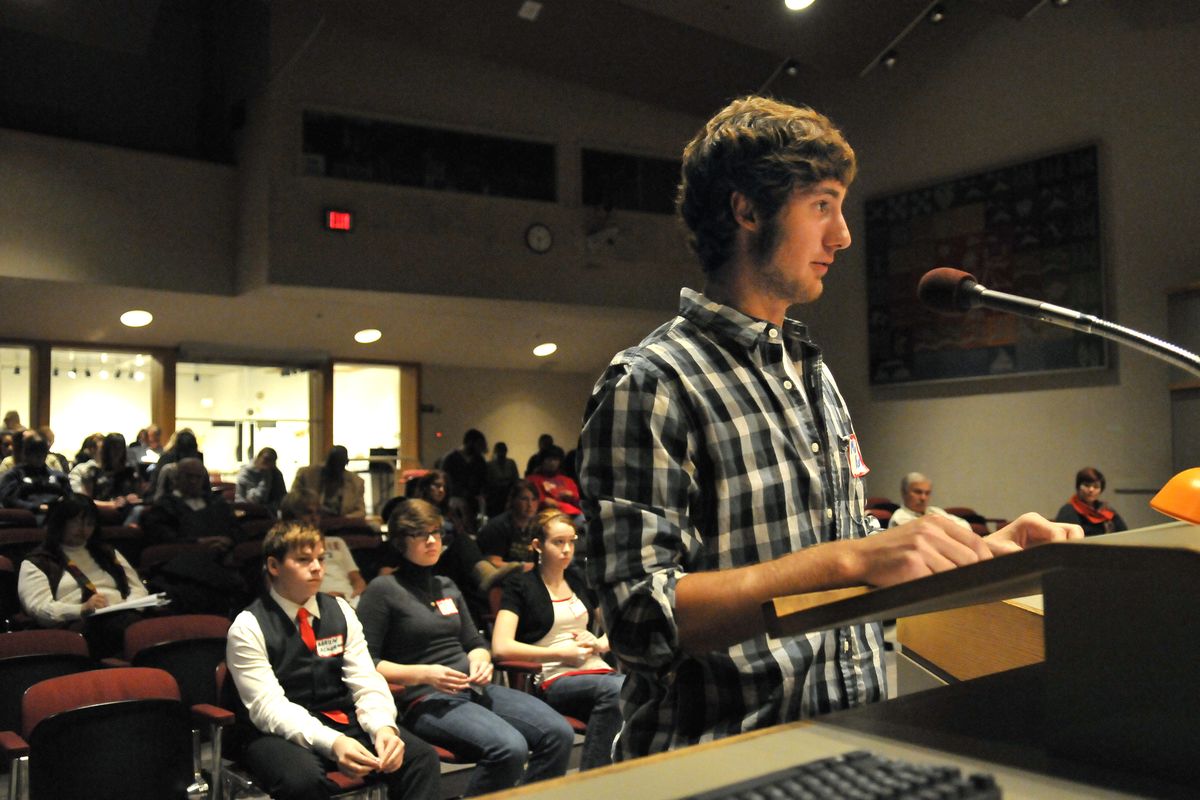 Matt Baker, a senior at Gonzaga Prep, asks a question of the City Council and mayoral candidates at the Chase Youth Commission’s candidate forum in the Spokane City Council chambers Oct. 6. Funding for the youth commission is in jeopardy as the mayor and City Council look for more budget cuts in the next fiscal year. (Jesse Tinsley)