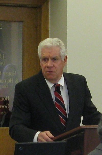 Mike Gwartney, director of the state Department of Administration, addresses lawmakers during his agency's budget hearing. Gwartney, a close friend of Gov. Butch Otter, works without a salary. He told lawmakers, 