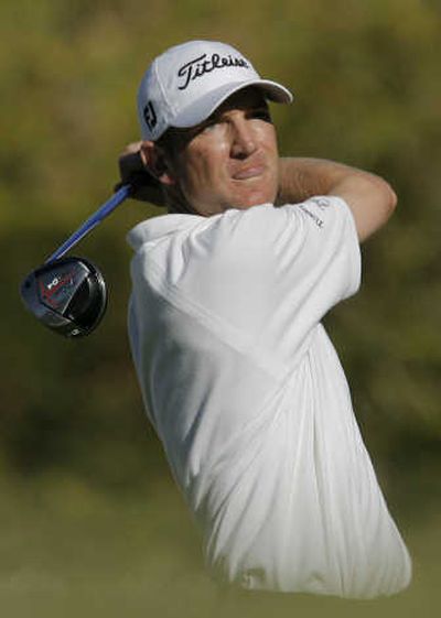 
George McNeill watches his drive on the 16th hole Sunday. Associated Press
 (Associated Press / The Spokesman-Review)