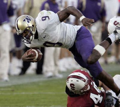 
UW running back Louis Rankin is part of Huskies' rushing game that ranks second in the Pac-10. Associated Press
 (Associated Press / The Spokesman-Review)