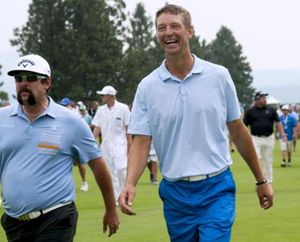 Former Sonics basketball great Detlef Schrempf, center walks with pro golfer Andres Gonzales during the Showcase Golf event. (Kathy Plonka)