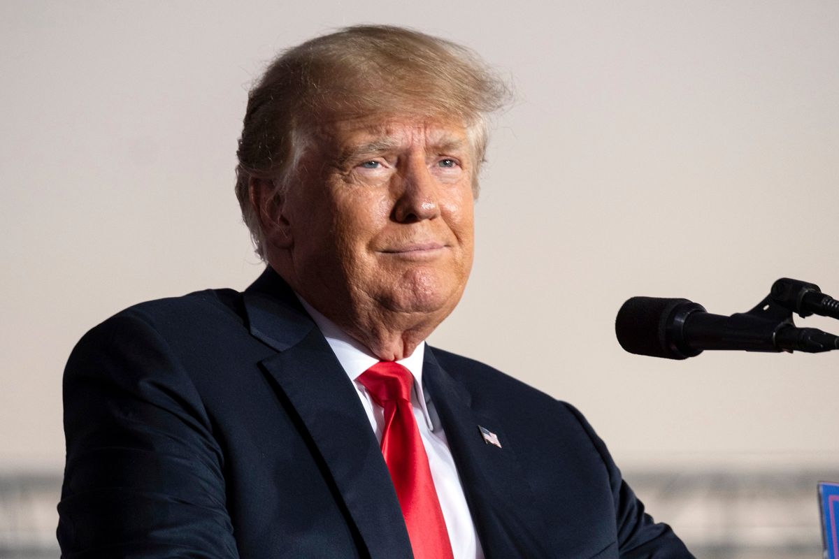 FILE - Former President Donald Trump speaks during a rally in Perry, Ga., on Sept. 25, 2021. The editor of Forbes magazine testified Thursday, Dec. 16, 2021, before a grand jury hearing evidence in a criminal investigation of former President Donald Trump and his business practices, answering questions about an article examining whether the former president inflated his wealth.  (Ben Gray)