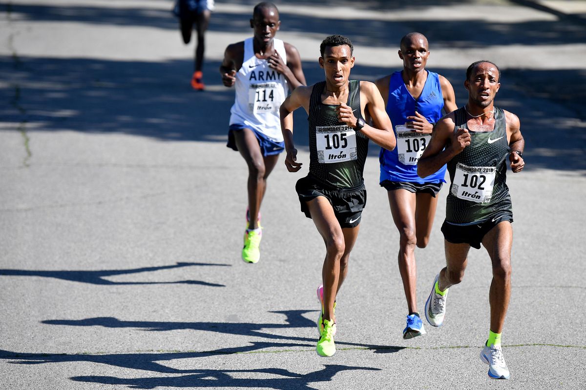 Jemal Yimer (102) pulls to the front of the Elite Men’s Race during Bloomsday 2018 on Sunday, May 6, 2018, in Spokane, Wash. (Tyler Tjomsland / The Spokesman-Review)