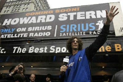 
Radio host Howard Stern waves to his fans in Union Square in New York.  
 (Associated Press / The Spokesman-Review)