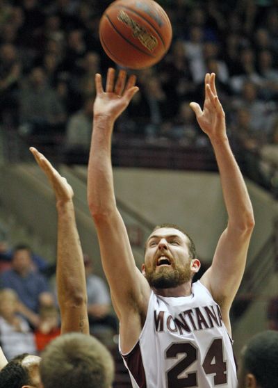 Derek Selvig goes up for two of his 16 points for Montana. (Associated Press)