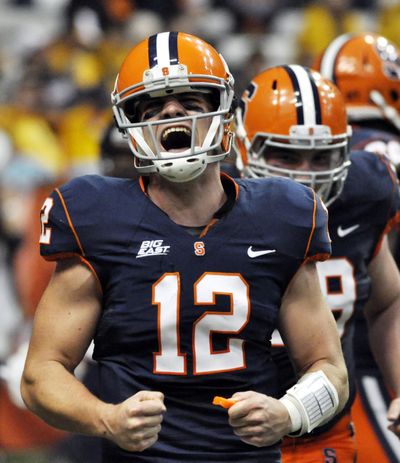 Syracuse quarterback Ryan Nassib found plenty to celebrate with three touchdown passes in a 49-23 upset of No. 11 West Virginia. (Associated Press)