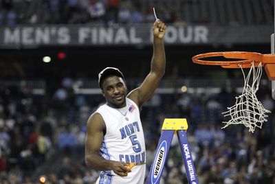 North Carolina’s Ty Lawson celebrates the dominating performance in the championship game. (Associated Press / The Spokesman-Review)