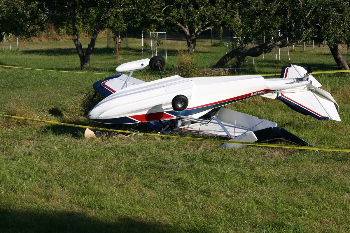 In this Friday, Aug. 31, 2012 photo provided by the Journal of the San Juan Islands, the plane piloted by author Richard Bach lies overturned after crashing in a field, in Friday Harbor, Wash. Bach, the author of the 1970s best-selling novella "Jonathan Livingston Seagull" among other spiritually oriented writings often rooted in themes of flight, was in serious condition Saturday at Harborview Medical Center. (Steve Wehrly / Journal Of The San Juan Islands)