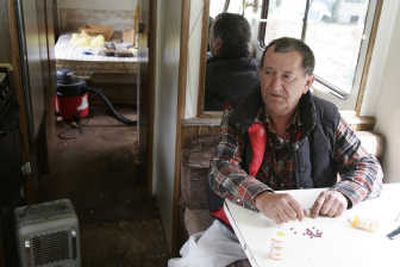 
Charlie Manning is seen  last month in his motor home in Hoodsport, Wash. Manning, who was attacked by flesh-eating bacteria while  in prison,  is suing the state prison system, claiming he had been told he simply had an allergic reaction. The Seattle Times
 (Greg Gilbert The Seattle Times / The Spokesman-Review)