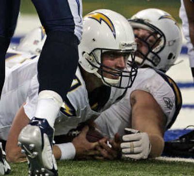
San Diego quarterback Billy Volek looks up after his 1-yard touchdown run in the fourth quarter gave San Diego the lead.Associated Press
 (Associated Press / The Spokesman-Review)